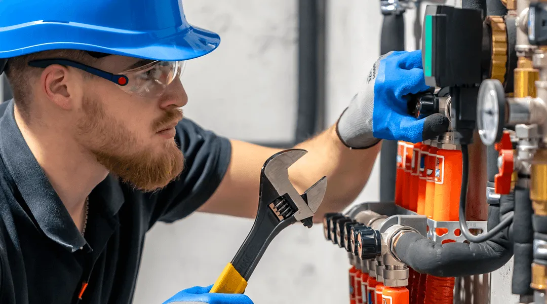 Plumber Fixing Pipework