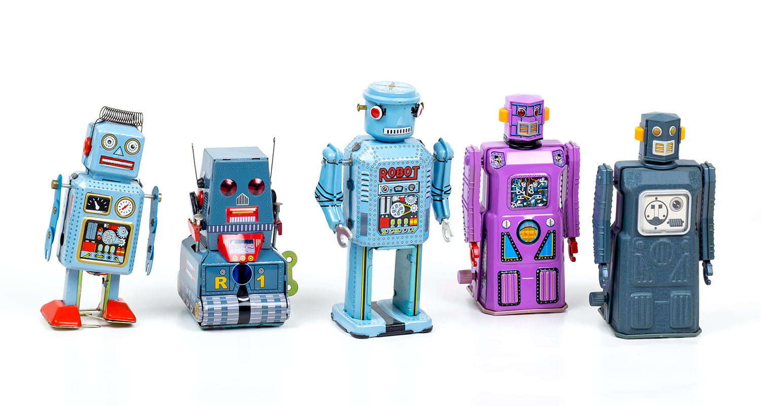 A line up of 5 mini vintage style robots