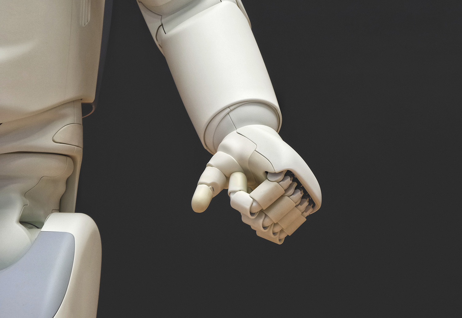 A close up of a robot arm