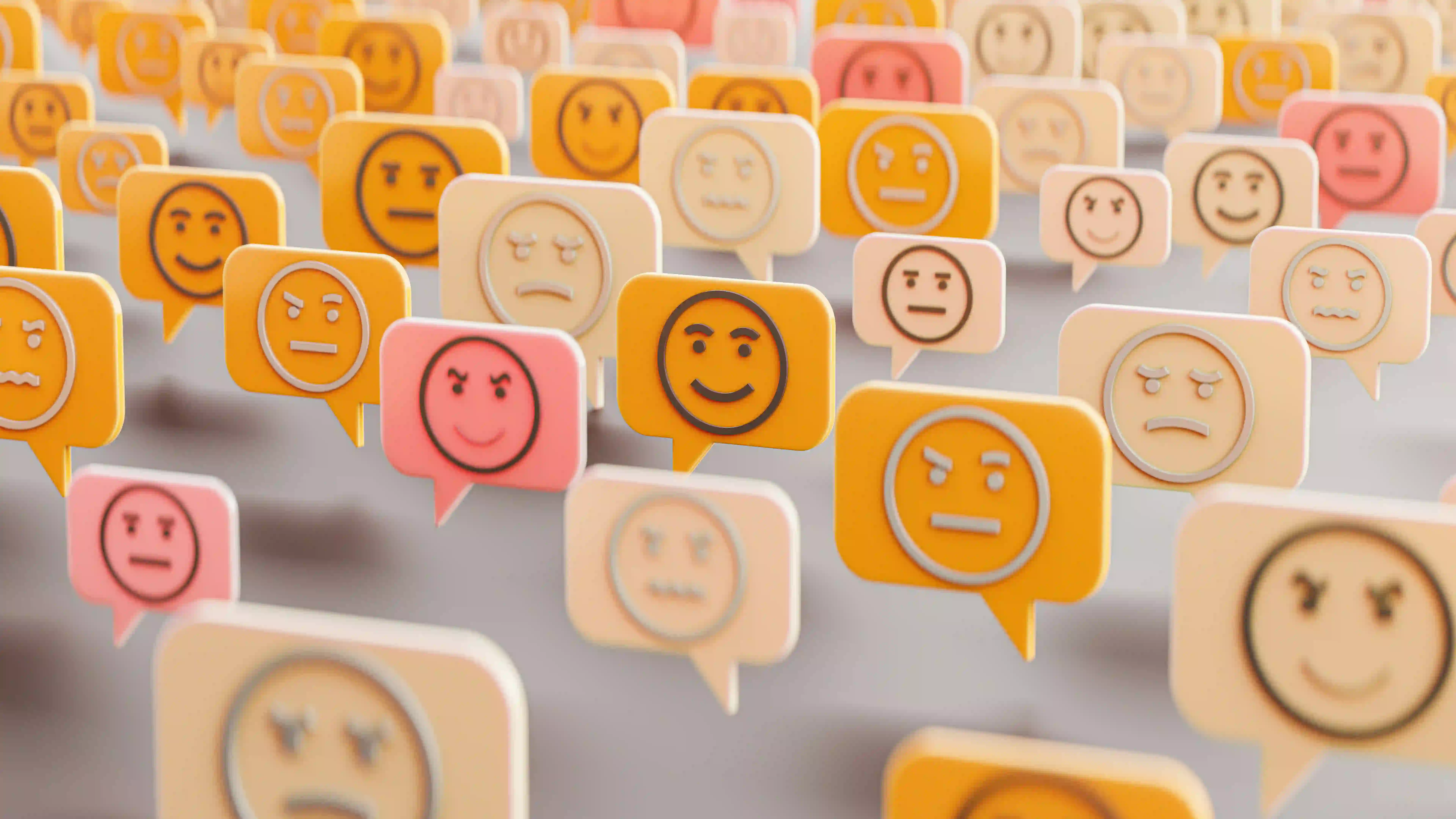 Eine Illustration, welche mehrere Sprechblasen mit Emojis zeigt, welche verschiedenes Feedback symbolisieren