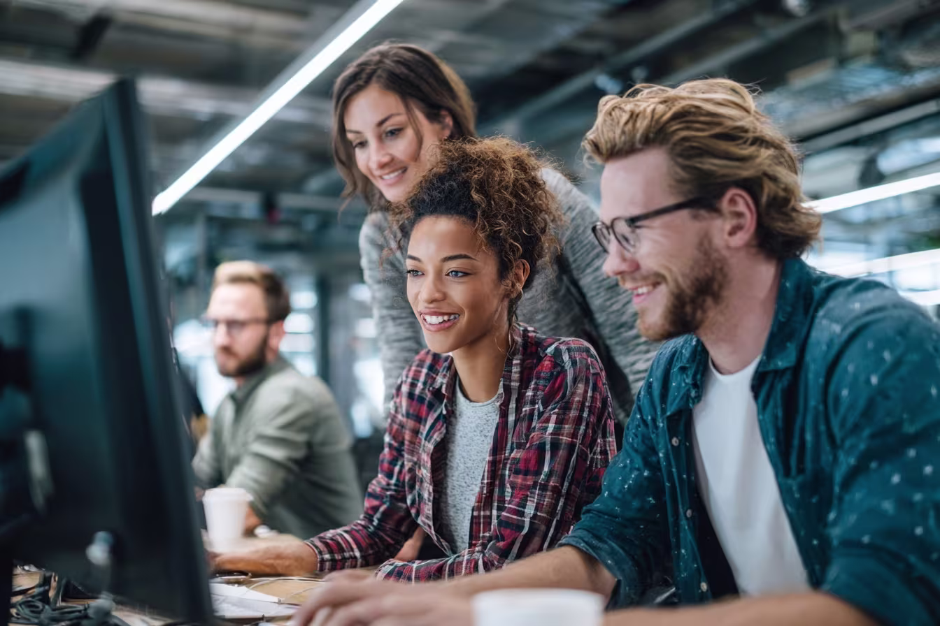 Team collaborating in optimized IT workspace