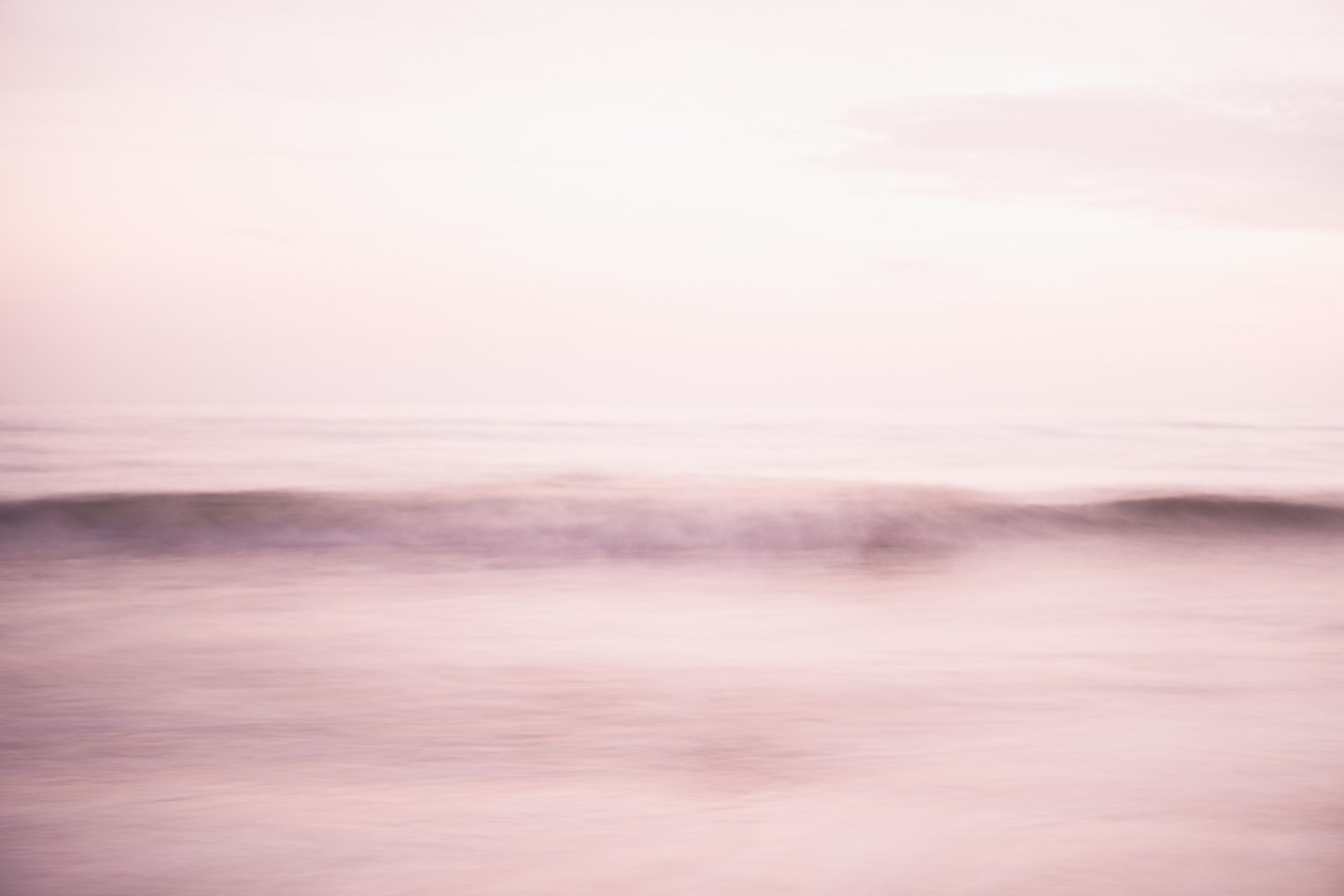 Blurry wave at sunset