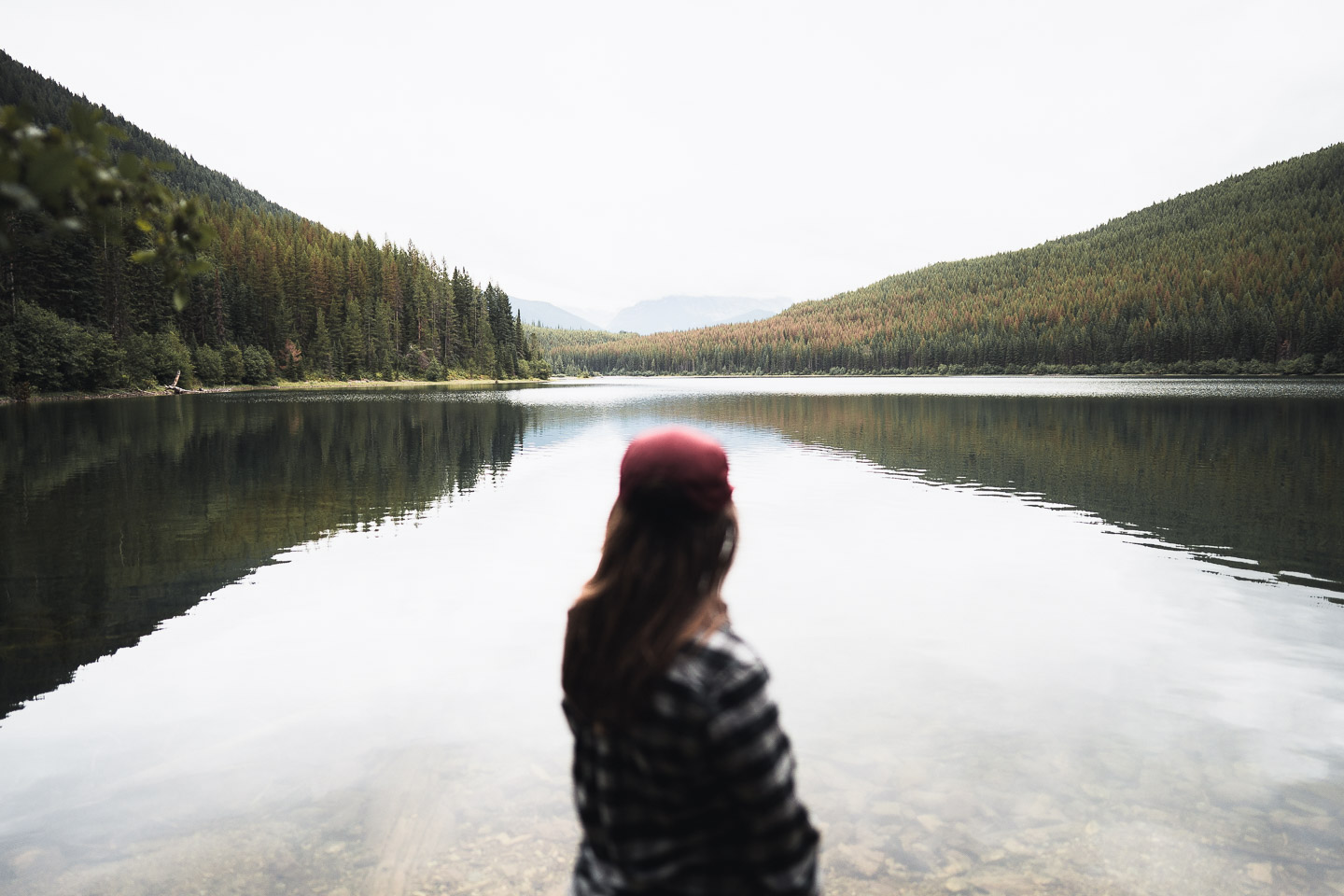 Woman looking out at lake in Montana