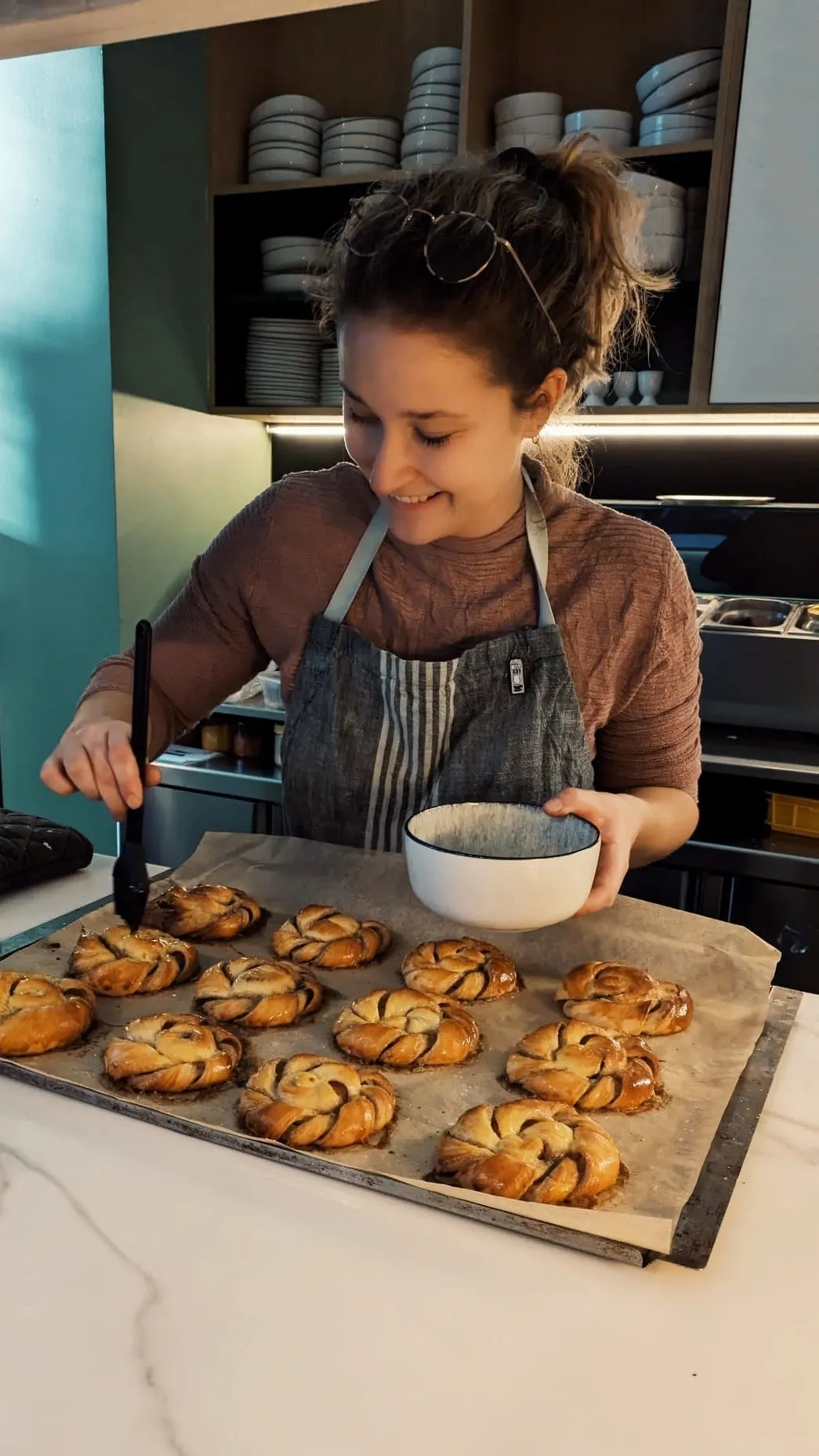 The chef preparing oven baked goodies