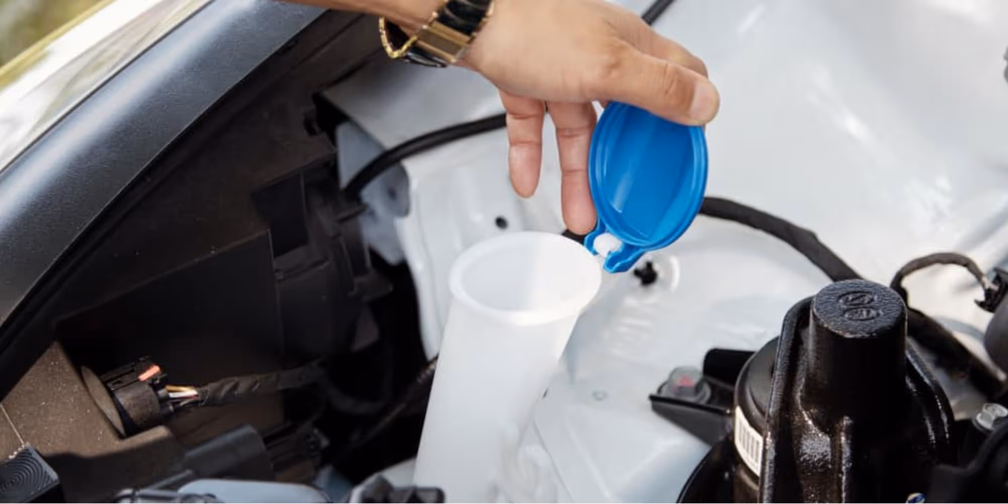 checking windshield washer level