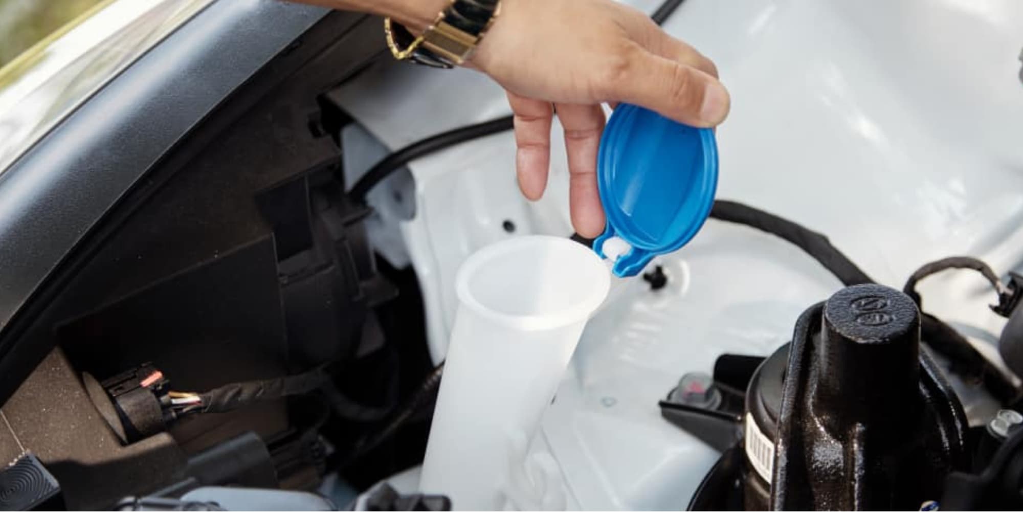 checking windshield washer level