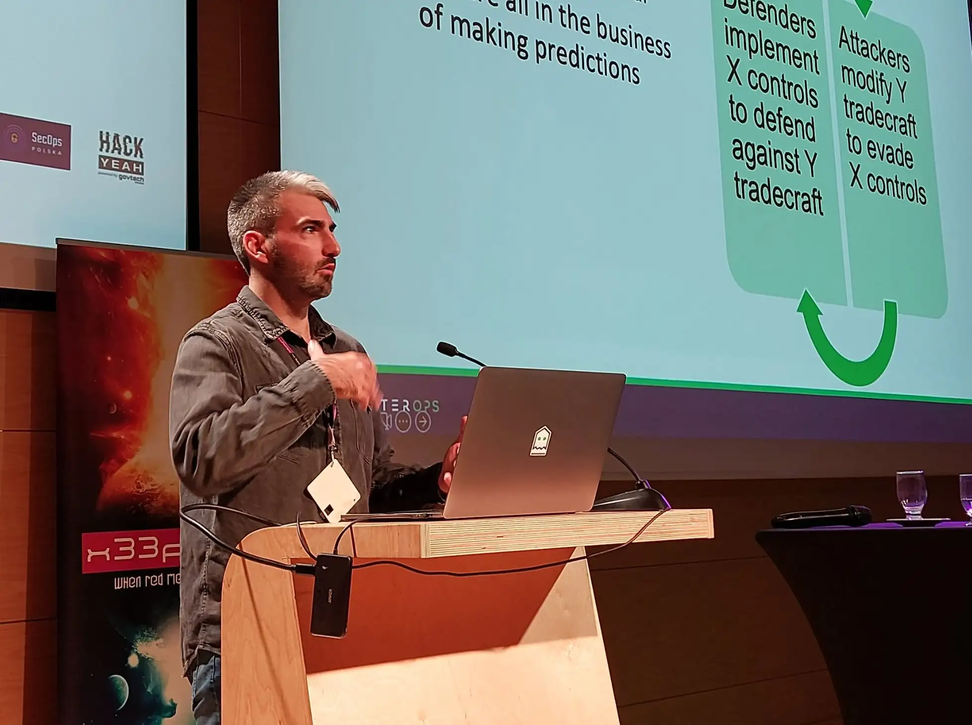 Security researcher Michael Barclay presents to a conference
