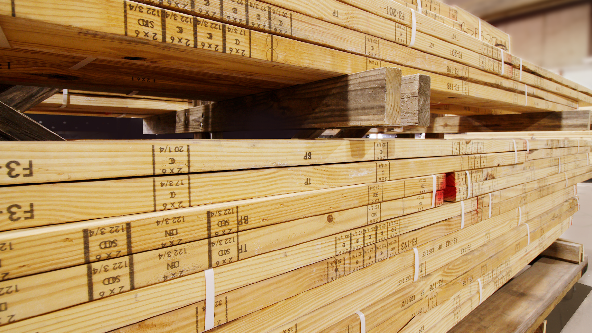 A photo of stacked lumber.