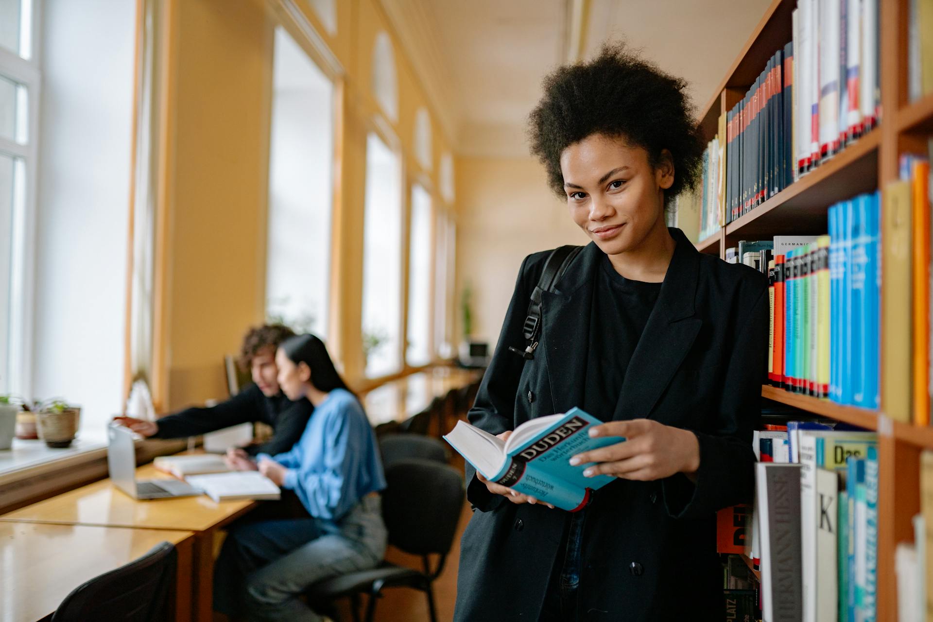 Student learning the German language in a library