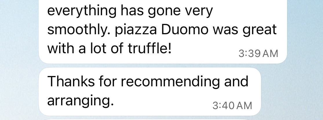 "Two text message bubbles on a light blue background. The first message at 3:39 AM reads 'everything has gone very smoothly. piazza Duomo was great with a lot of truffle!' The second message at 3:40 AM reads 'Thanks for recommending and arranging.'