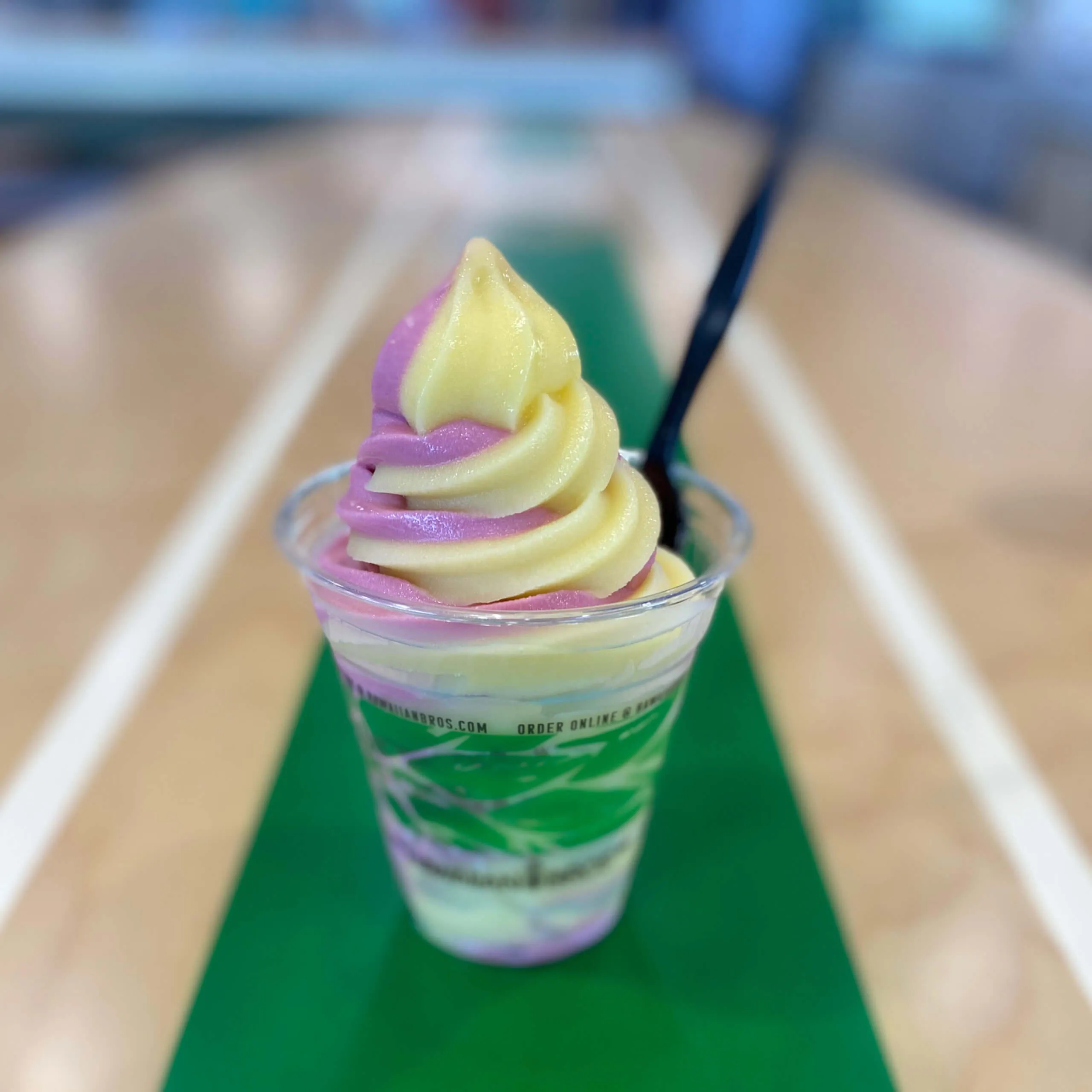 Hawaiian Bros swirled Dole Soft Serve in cup.