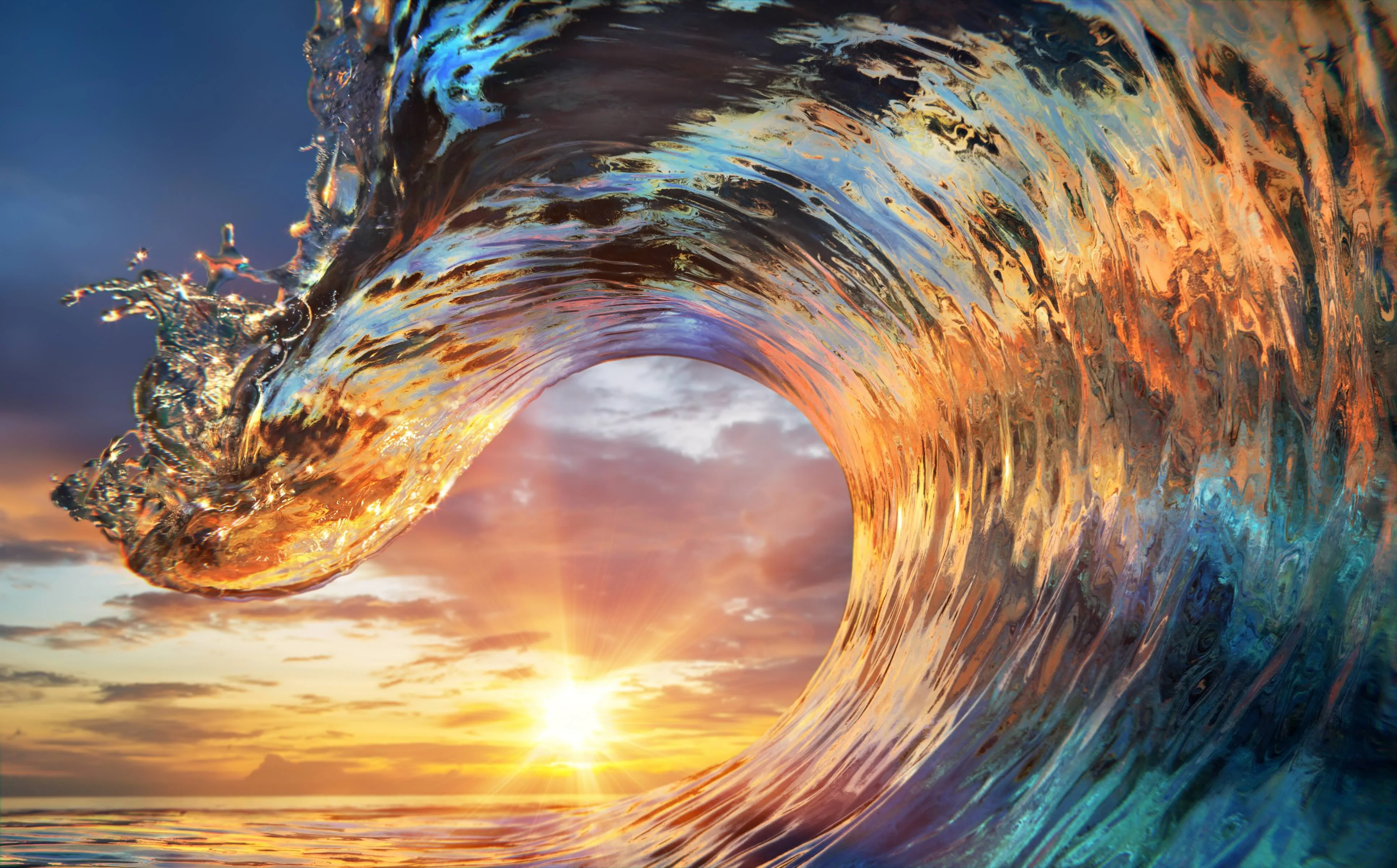 A large wave barrel at sunset.