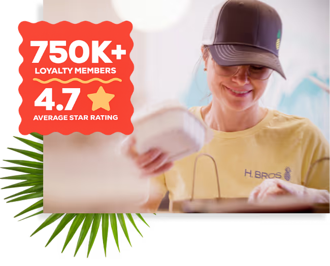 A Hawaiian Bros employee bagging a takeout order; text reading "650K loyalty members, 4.7 average star rating"
