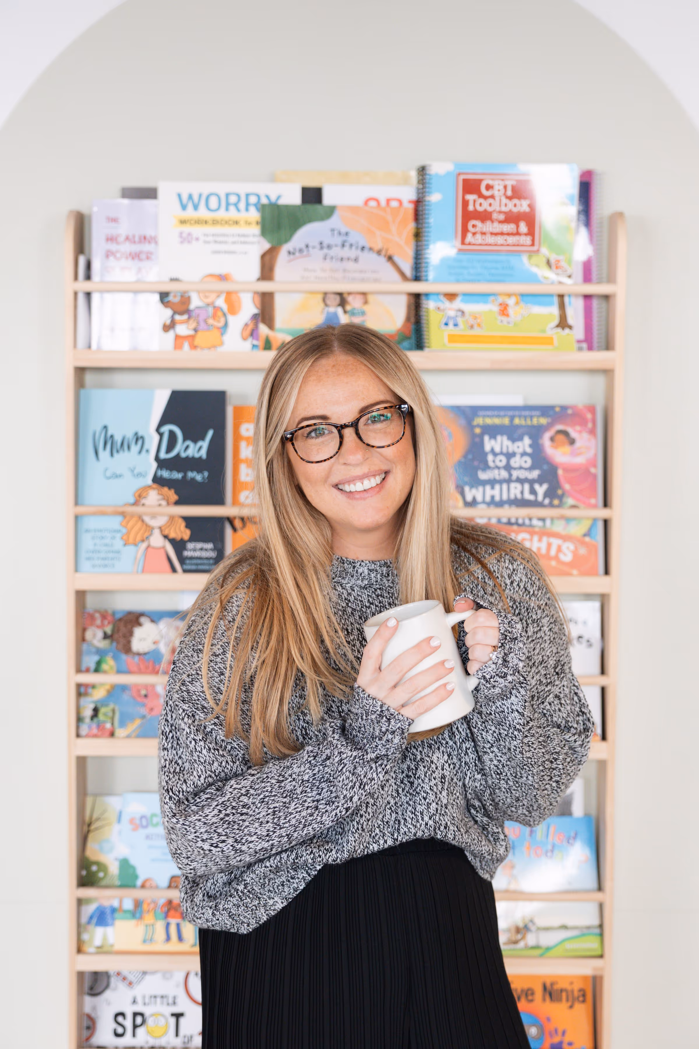Child therapist with emotion books and ukulele at Playful Pathways in
Birmingham MI
