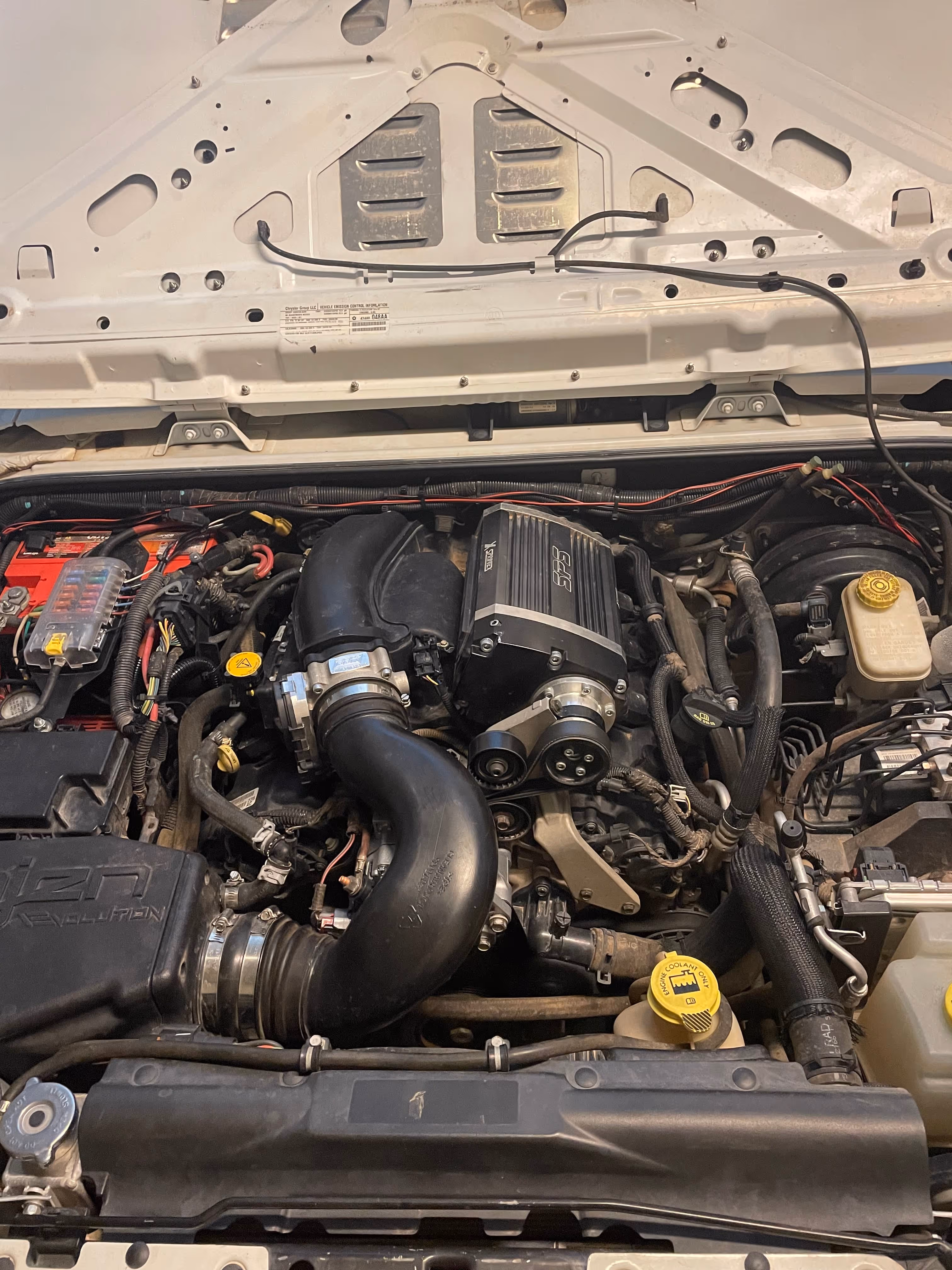 Detailed view of a car engine with black and red components