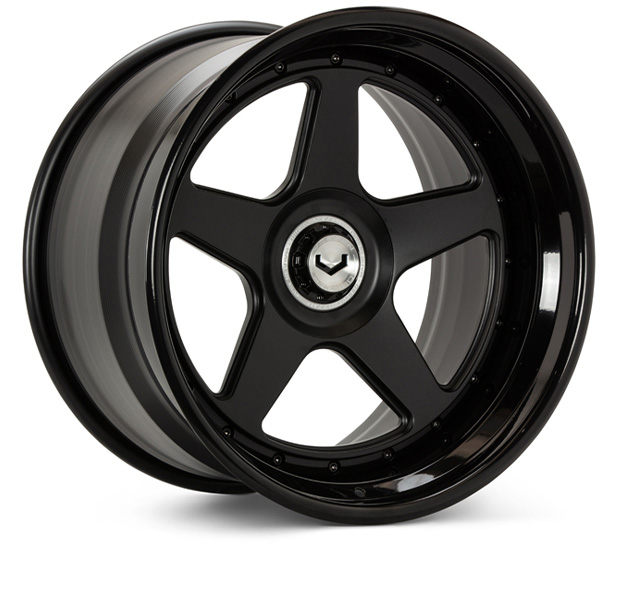 Black five-spoke alloy wheel with Vossen logo and glossy finish