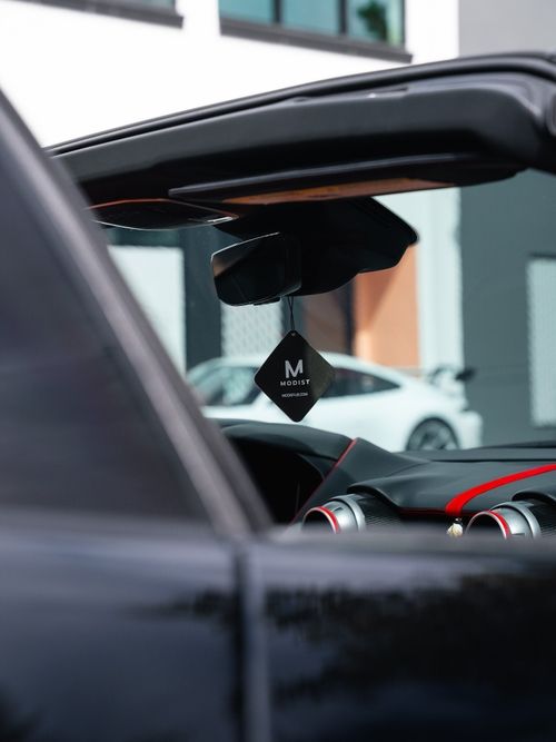 A subtle detail that speaks volumes. The Modist Air Freshener is designed for interiors that deserve the same level of thought as the build itself. Finished in a clean matte black with the Modist mark, it hangs with intention, adding a refined touch without distraction. Scented with rich sandalwood, it delivers a warm, smooth aroma that elevates the driving experience. Never overpowering. Just enough to create a calm, premium atmosphere every time you step in.