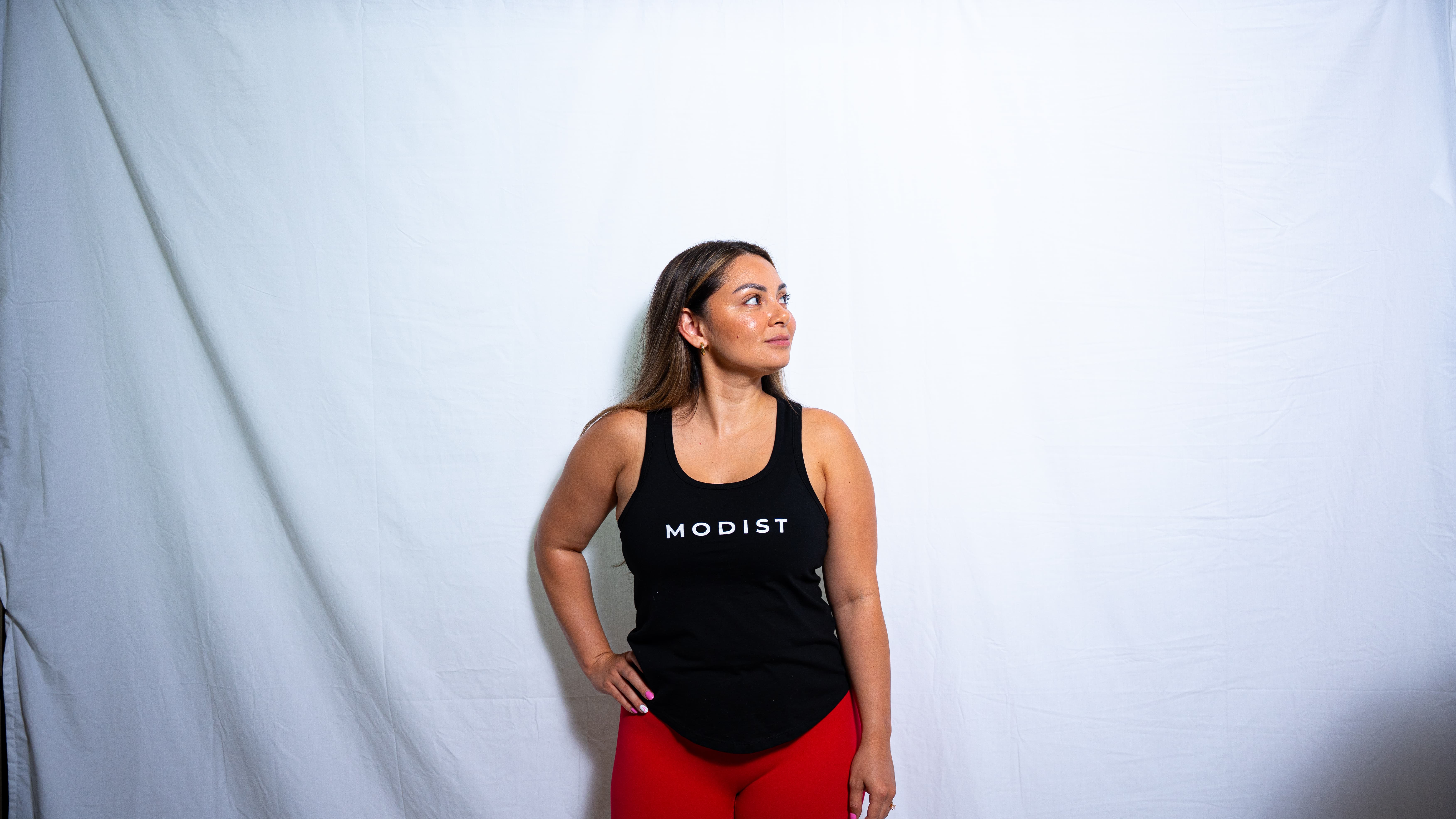 Built for movement and everyday wear. The Essential Tank features a premium cotton blend with a flattering athletic fit, soft fabric, and signature Modist branding. Designed to perform from the gym to the garage.