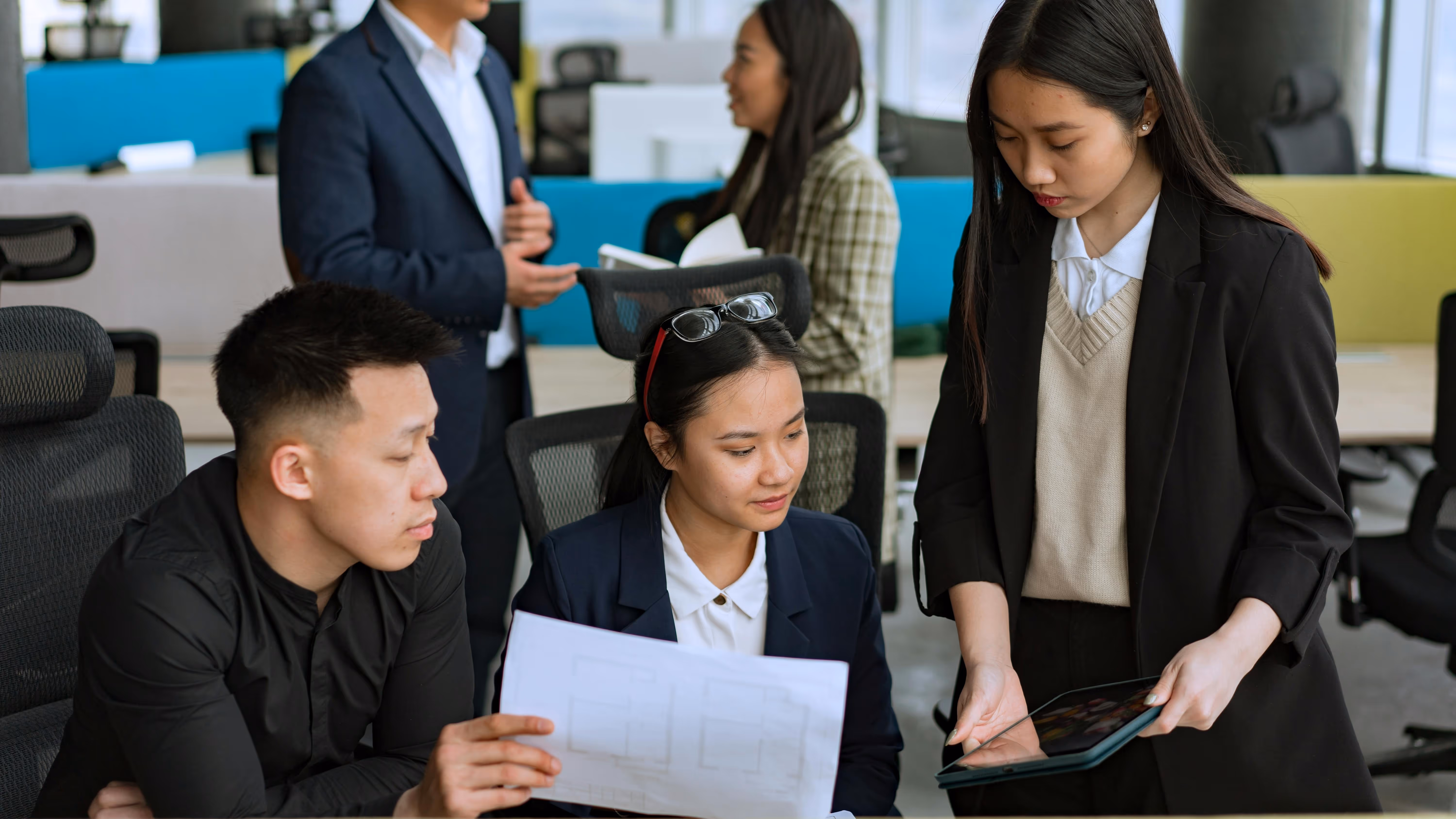 A group of diverse people collaborating at the workplace