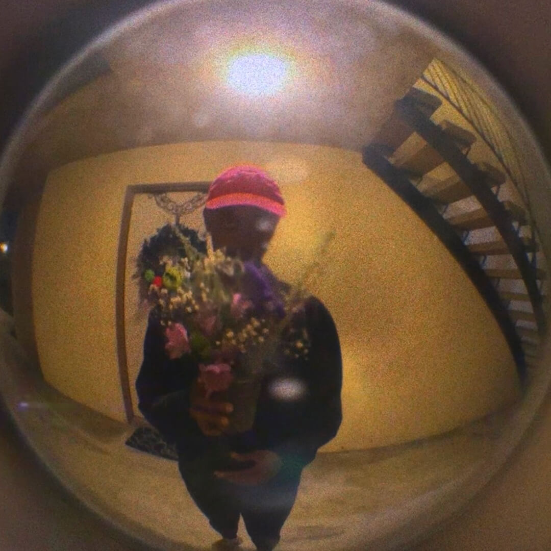 image of person holding flowers