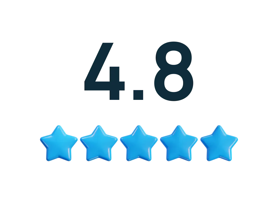 Modern two-story house with a black and white exterior, a driveway with a parked silver SUV, surrounding greenery, and a fenced garden.