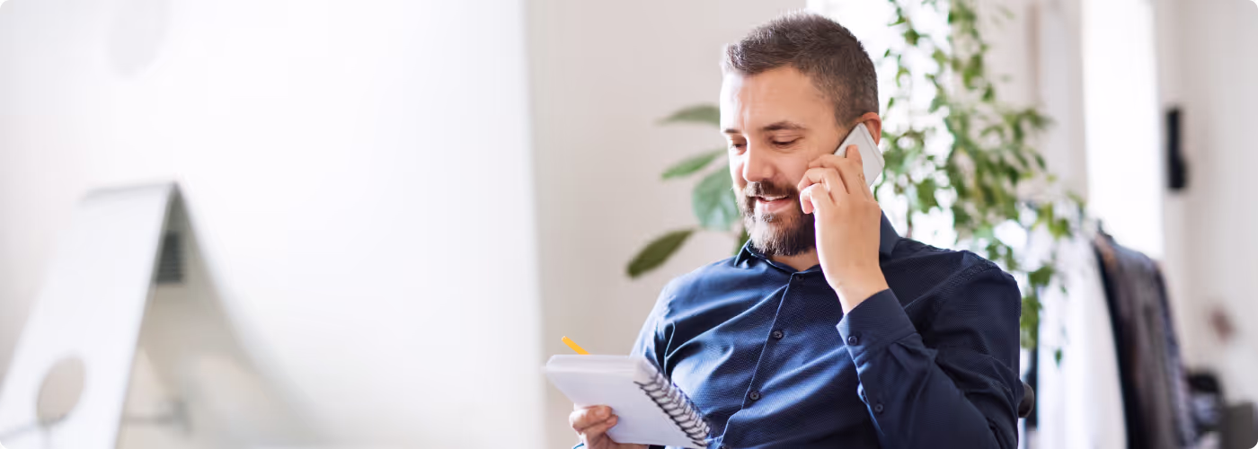 Male sitting on the phone