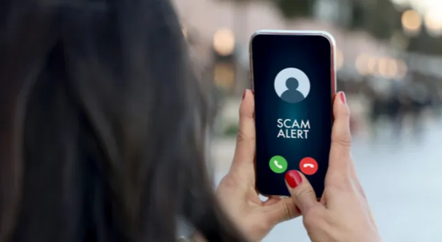 iPhone showing a screen that says Scam Alerts