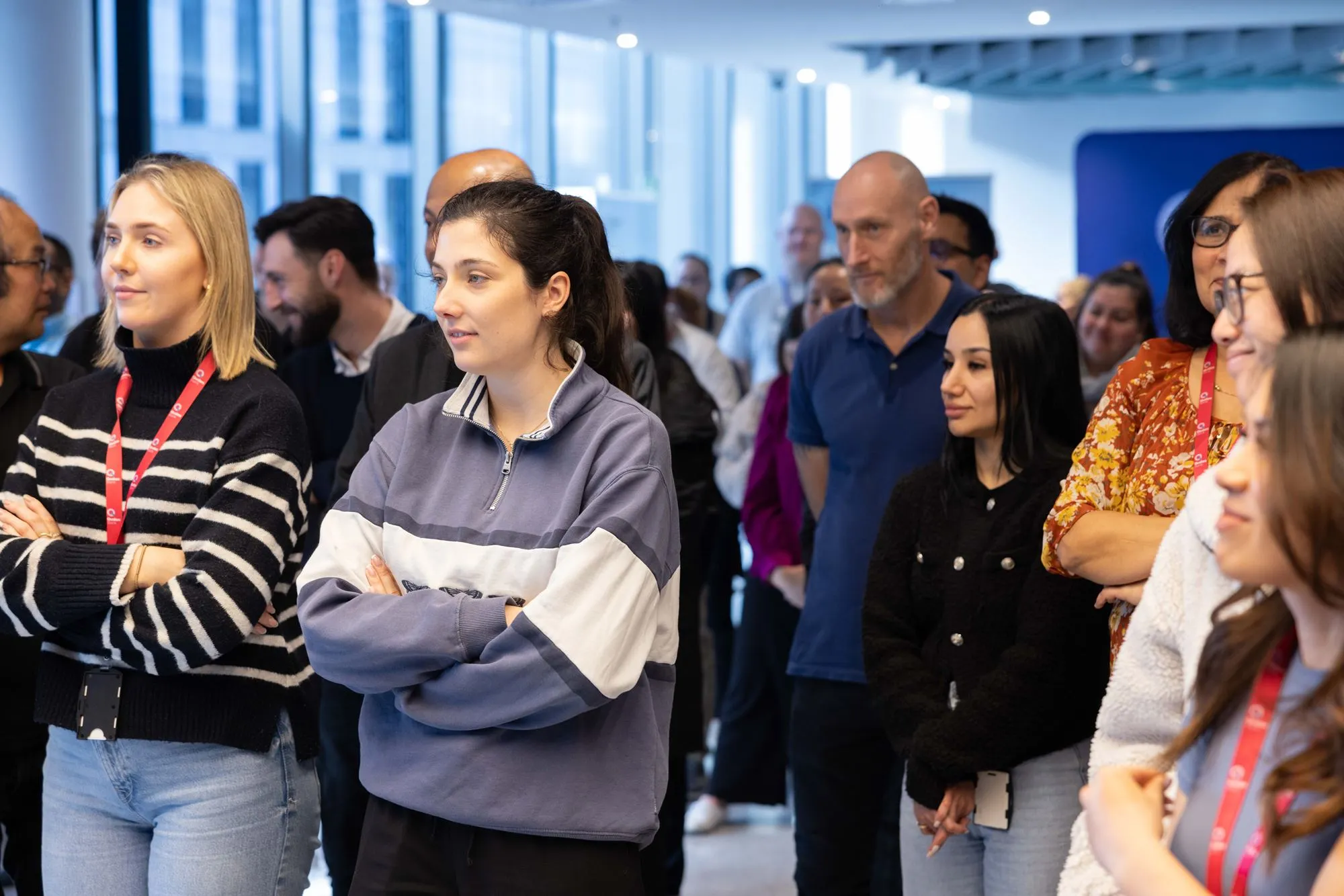 Qudos Bank staff listening to CEO speech at branch launch