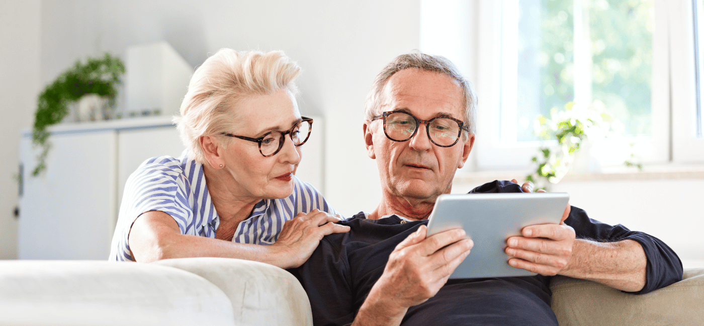Couple looking at their ipad