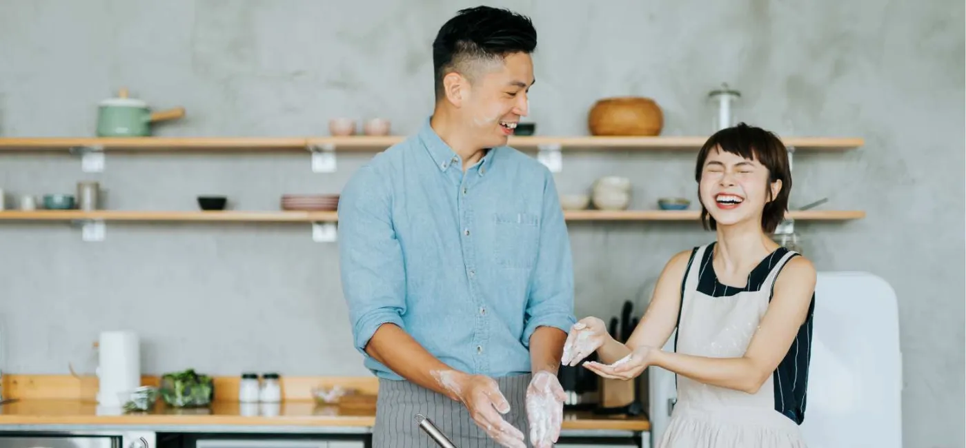 Couple cooking in kitchen together