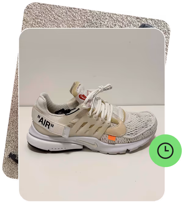 A card displaying a photo of a sneaker with a "in progress" clock icon.