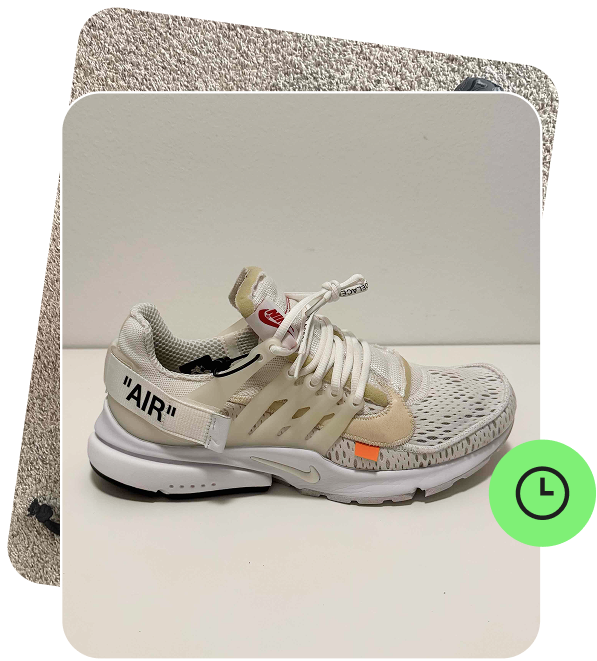 A card displaying a photo of a sneaker with a "in progress" clock icon.