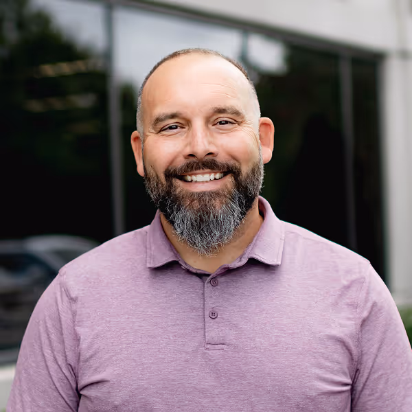 a man smiling for the camera