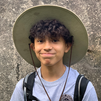 Headshot of Intern Hector from 2020 - his first year