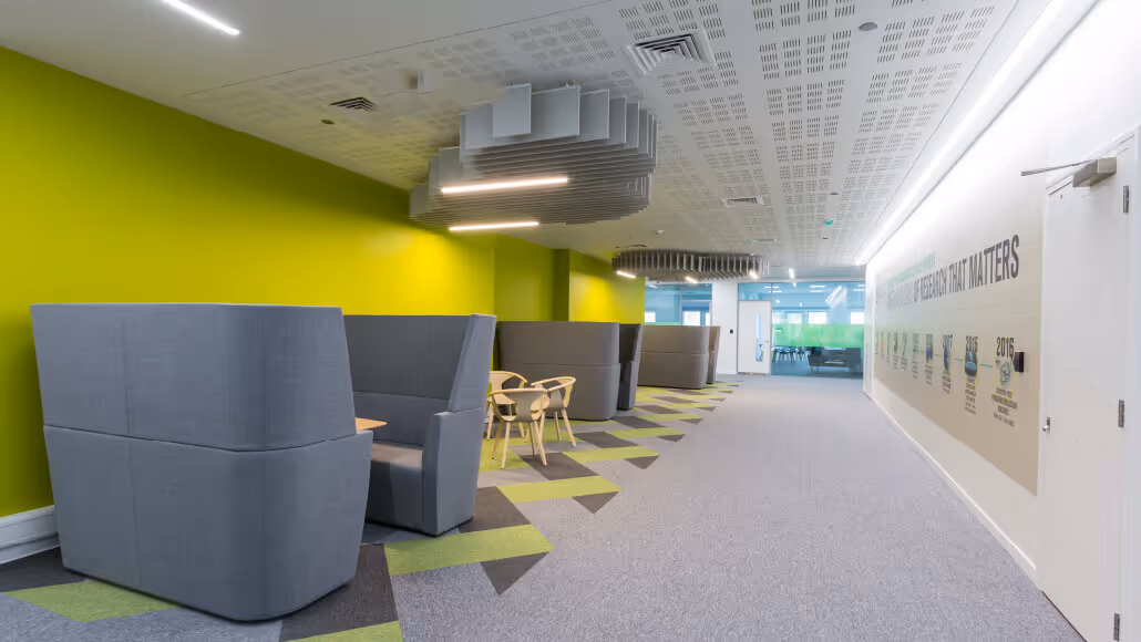 Modern coworking space with green interiors at Dubai Knowledge Park.