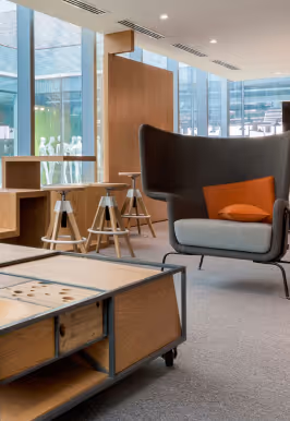 Modern lounge space inside Dubai Knowledge Park with stylish seating.