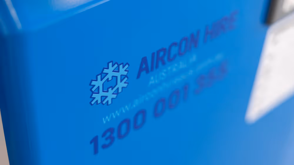 Blue surface with Aircon Hire Australia logo, website URL, and phone number 1300 001 5865.