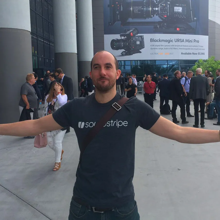 adam with his arms out