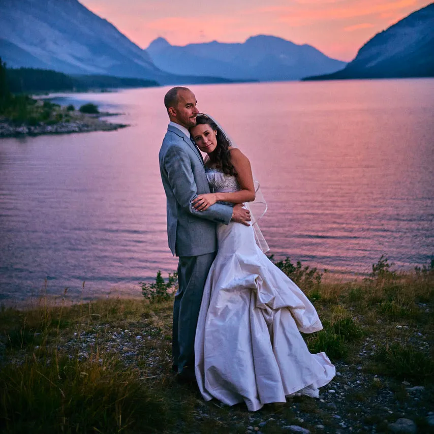 adam and his wife at their wedding
