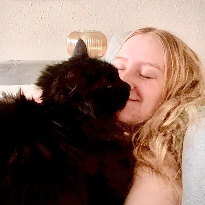 ashton and a black cat