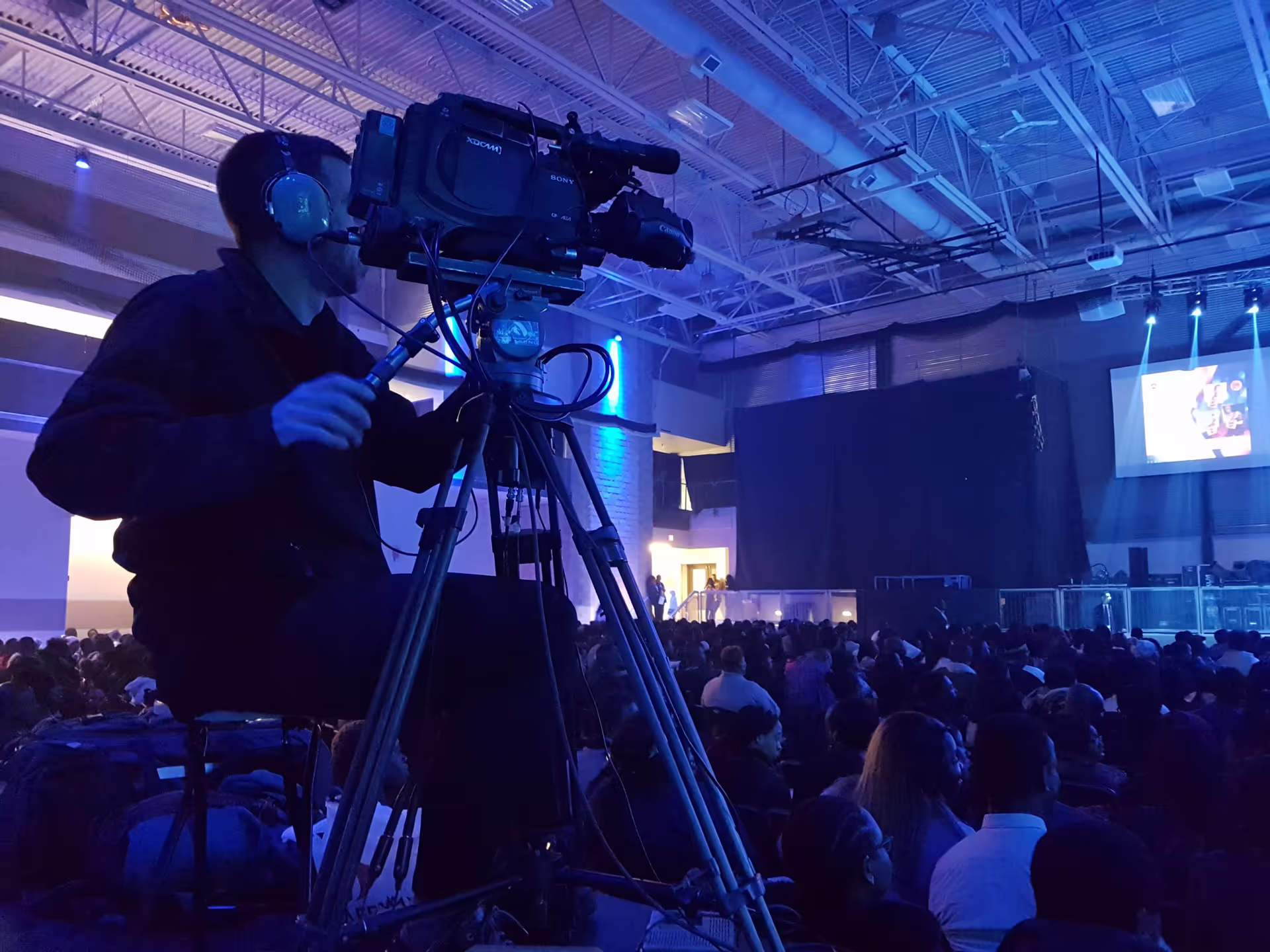 a camera films a stage