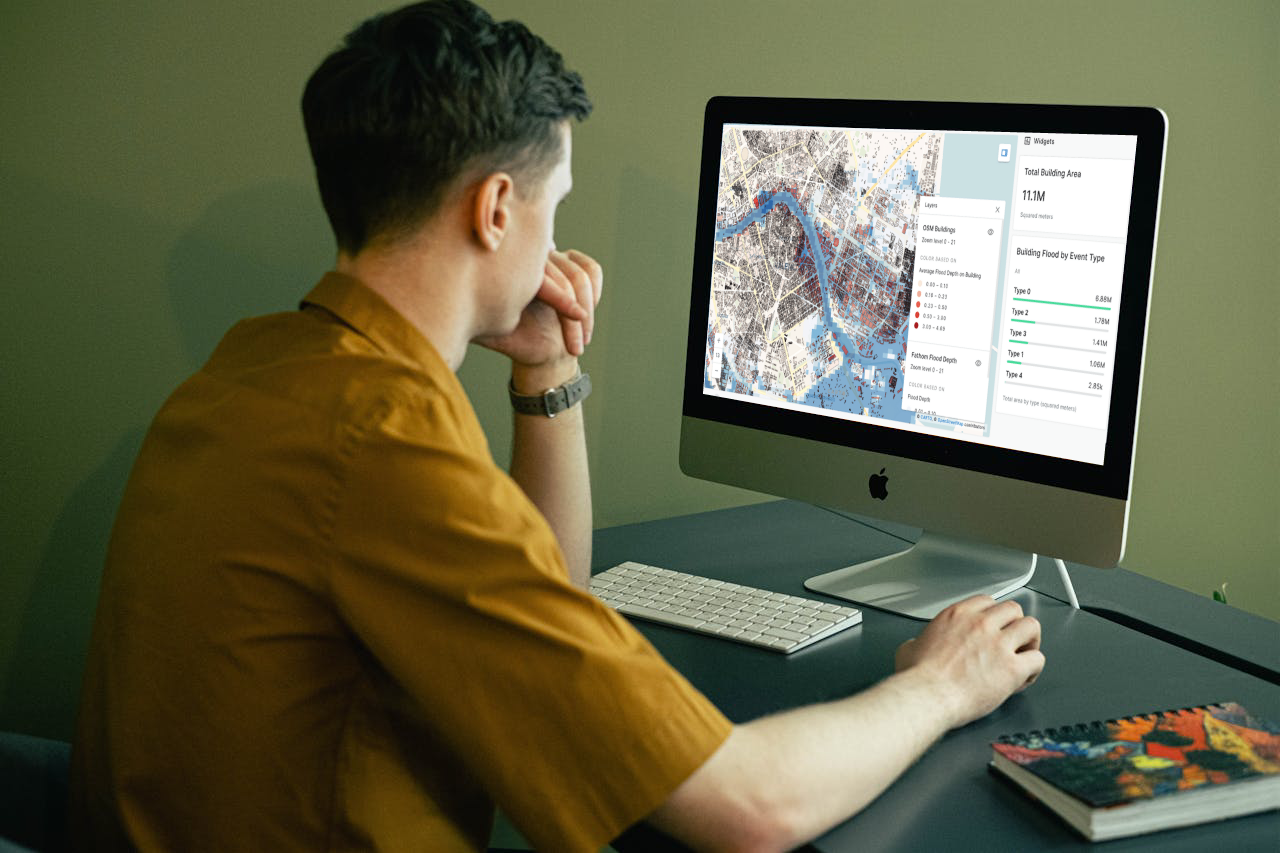 Person looking into map - Cat Modeling