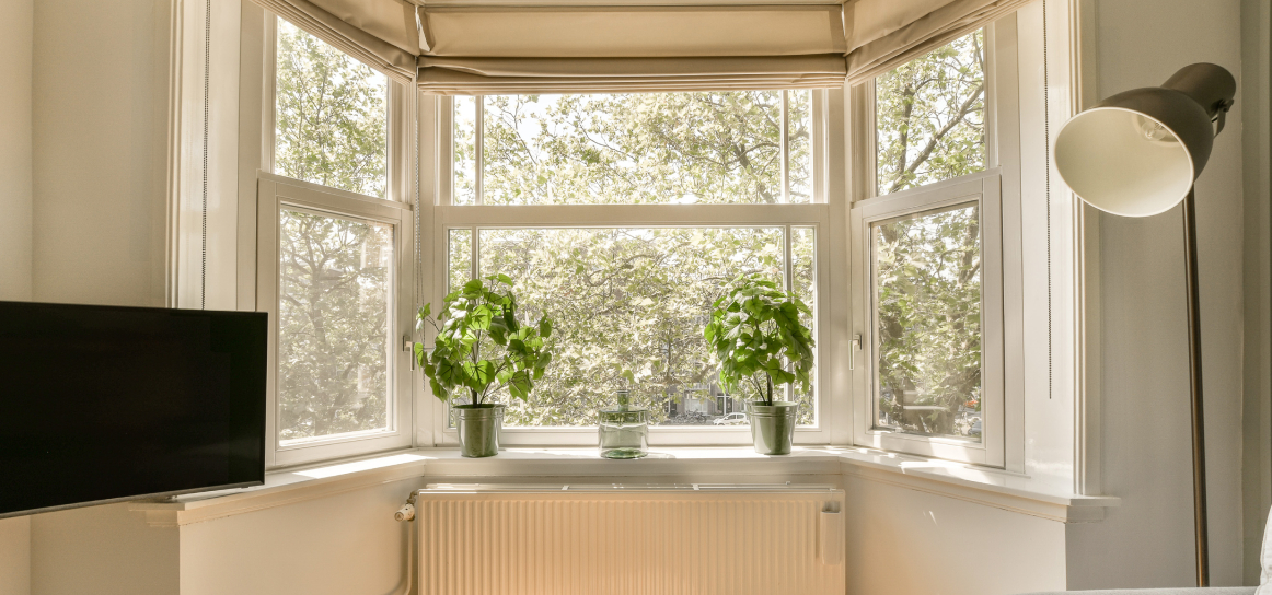 White uPVC vertical sliding sash window with double-glazed panes 