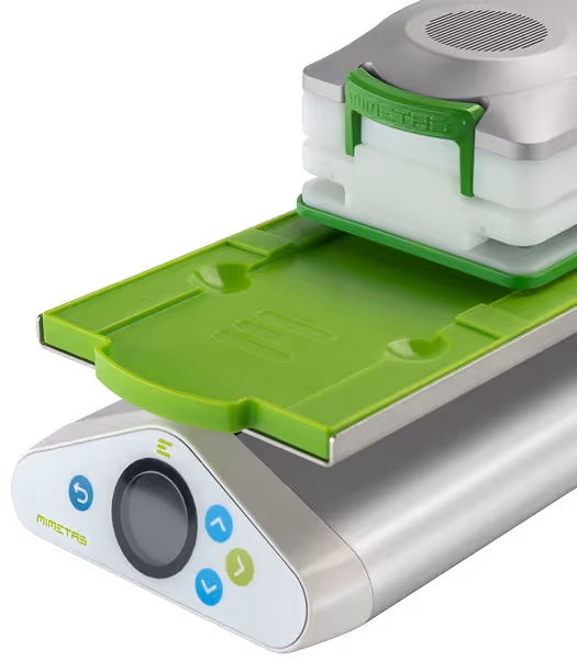 Modern green and white scientific laboratory device with control panel
