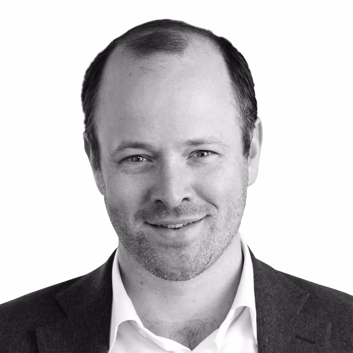 Professional headshot of a smiling person in a dark suit jacket