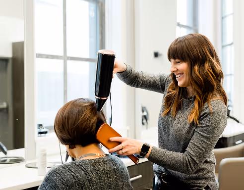 hair dresser doing hair