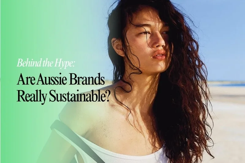 A woman with long, wavy hair stands on a beach with sunlight on her face. Text beside her reads: Behind the Hype: Are Aussie Brands Really Sustainable? on a green and blue gradient background.