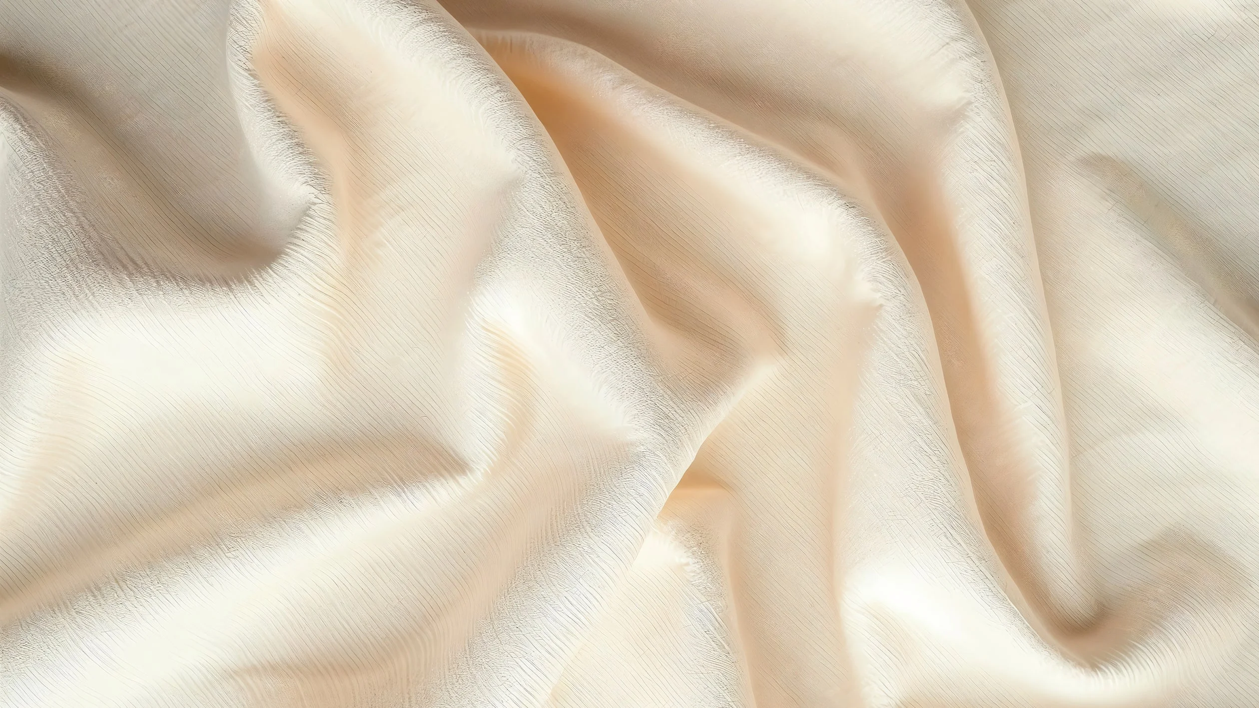 Close-up of a white fabric, showcasing its texture and weave details.