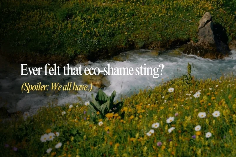 A person looking contemplative, surrounded by eco-friendly products, reflecting on feelings of eco-shaming.