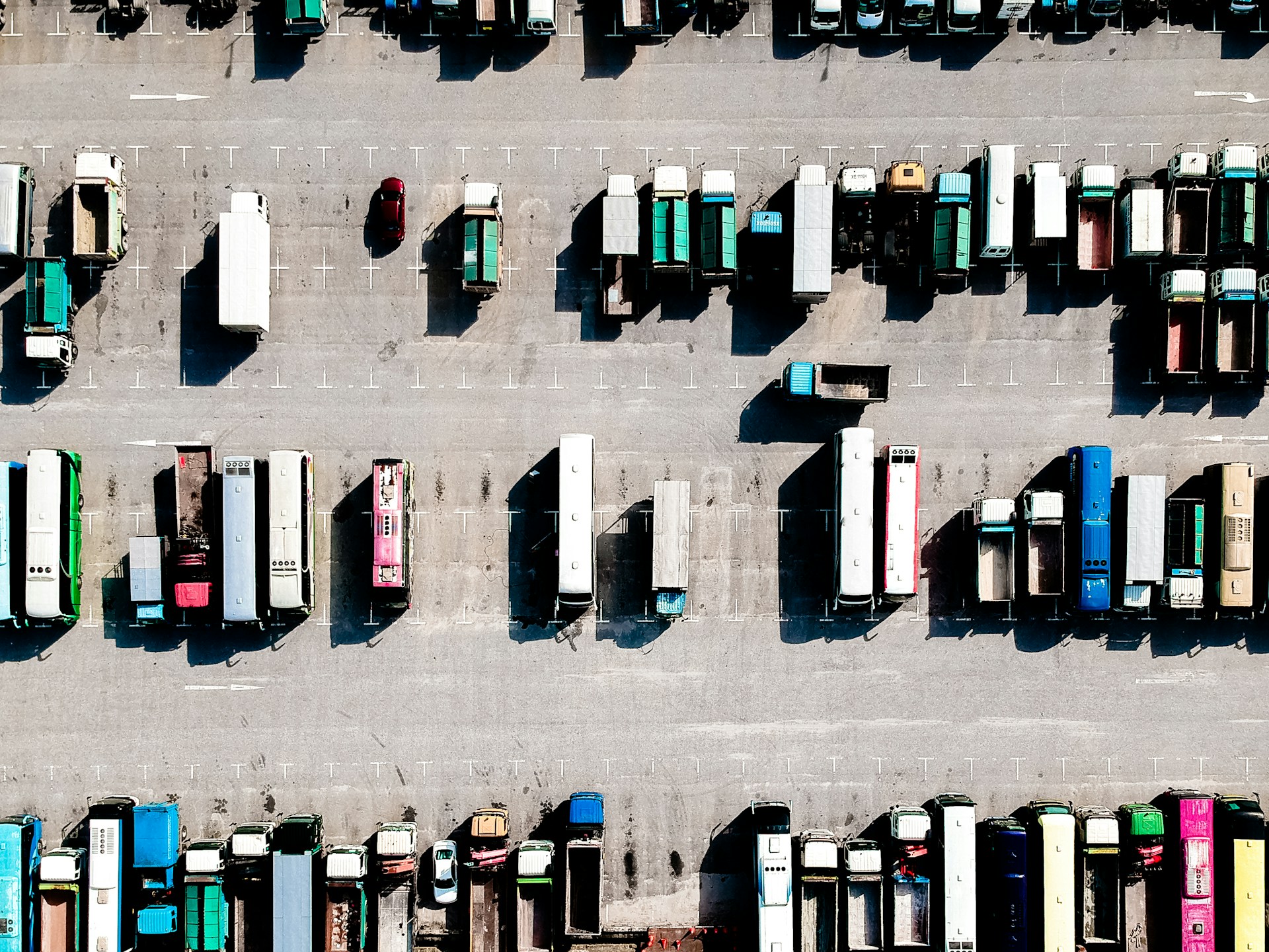 Top view of cargo trucks on a parking